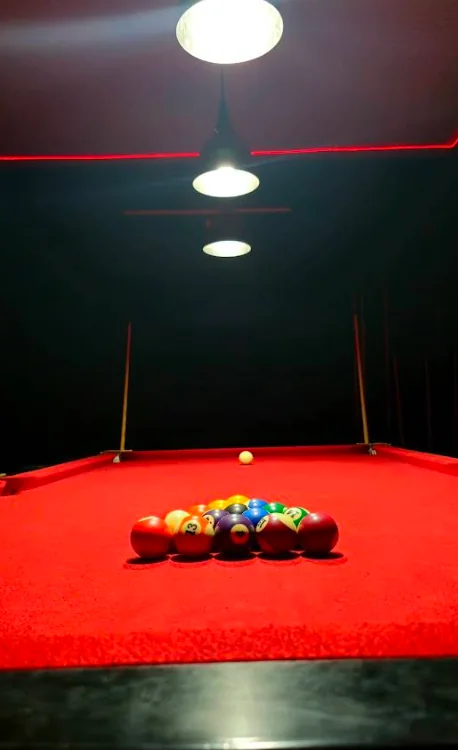 Pool table rack under red light